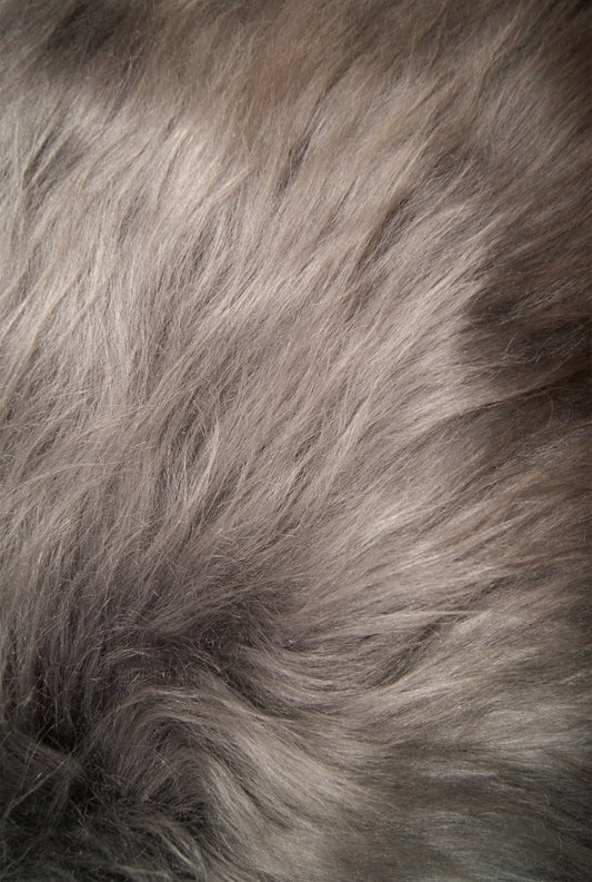 Gray and white synthetic animal print seat cushion, 15x15 inches, with plush textured fabric, by HomeRoots.