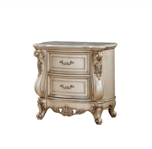 Antiqued white two-drawer mirrored nightstand by HomeRoots with elegant design and vintage-inspired details.