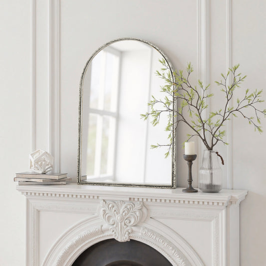 Arched silver mirror with tempered glass frame by Anthony & Home, showcasing a sleek, modern design with reflective surface.