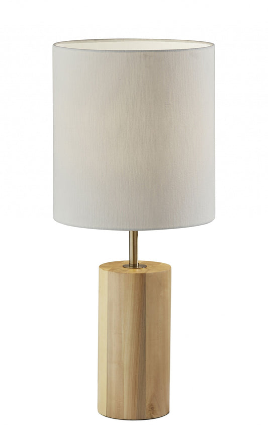Natural wood circular block table lamp by HomeRoots, featuring a modern design with a warm wood finish and a fabric shade.
