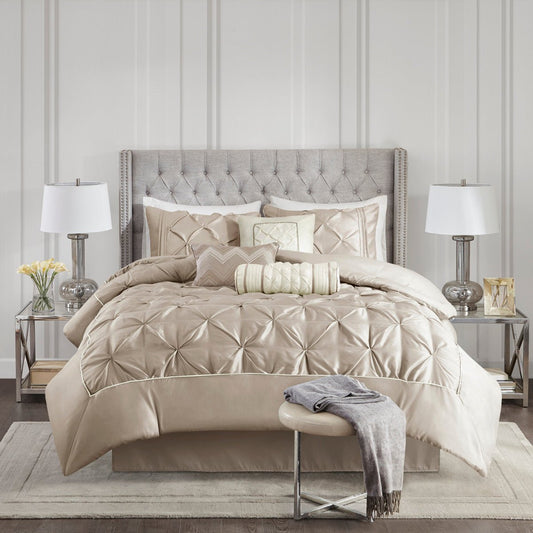 King Laurel tufted comforter set by Anthony & Home with plush fabric and tufted design, shown on a neatly made bed.