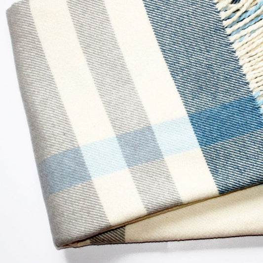 HomeRoots plush blue plaid throw blanket with tassels, cozy and soft, perfect for adding style to a sofa or bed.