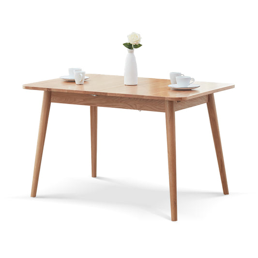 Solid oak extendable dining table by Anthony & Home with a sleek, natural finish and adjustable length for versatile dining space.