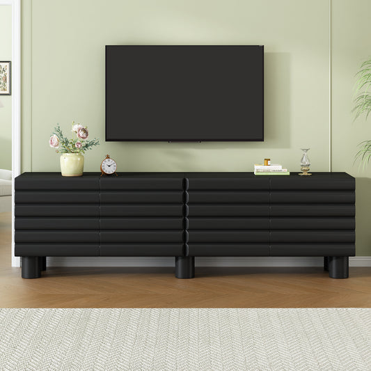 Limited edition matte black MDF media console with cylindrical legs, suitable for 75-inch TVs by Anthony & Home.