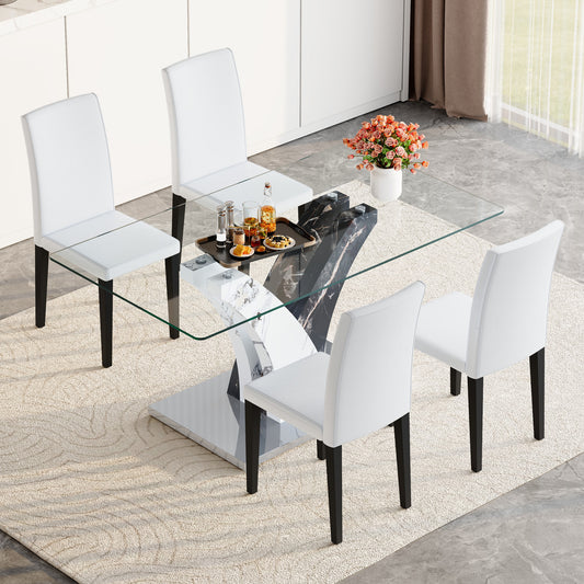 Modern dining table with tempered glass top and artistic MDF legs paired with four white PU dining chairs.