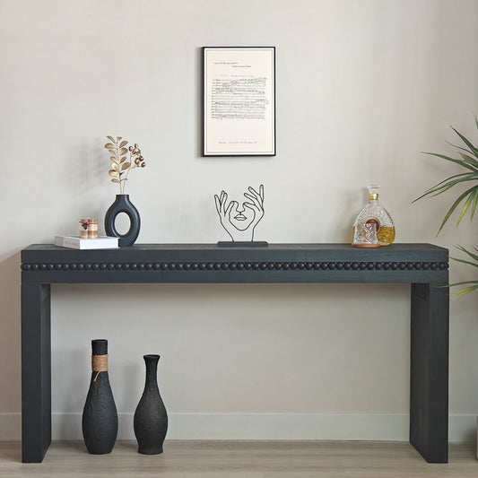 Antique black console table from the Artisan Collection by Anthony & Home showing a sleek wooden surface and elegant design.