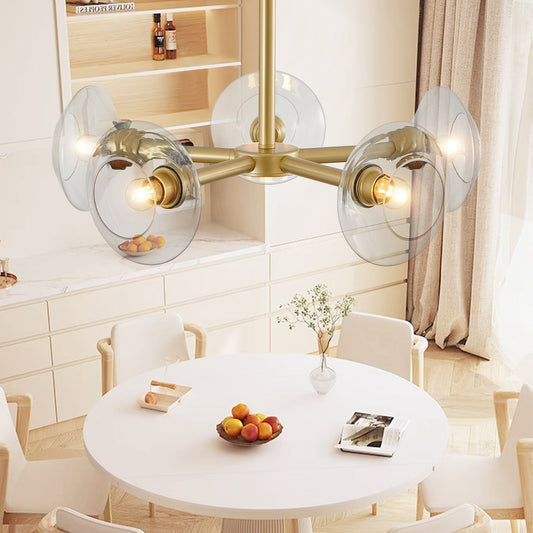 Gold iron Sputnik chandelier with five lights, contemporary atelier design by Anthony & Home, featuring a modern starburst style.