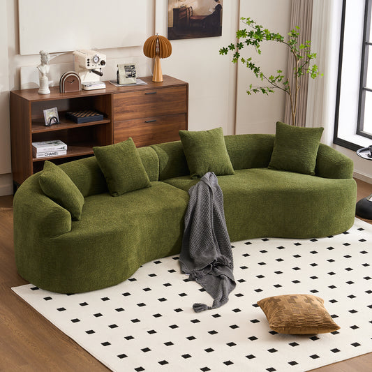 Forest green Atelier curved modular sectional sofa by Anthony & Home, featuring plush cushions and modern design.