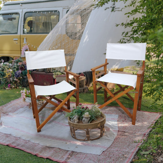 Natural solid wood director chair set with canvas seats by Anthony & Home, showcasing a stylish and durable seating option.