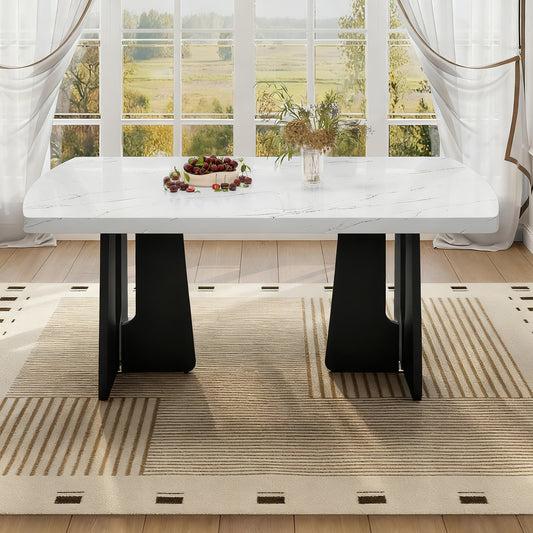 Black and white faux marble dining table with geometric black legs by Anthony & Home