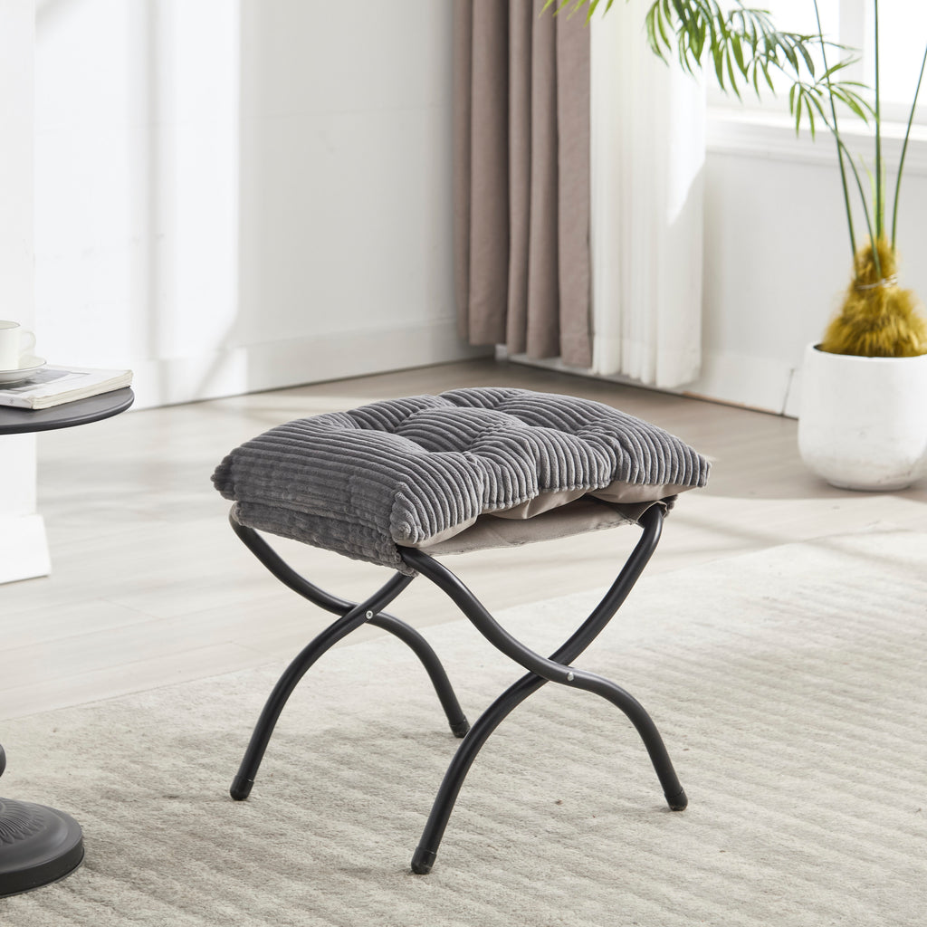 Grey upholstered lounge chair with matching ottoman and armrests, stylish and comfortable for modern living spaces.