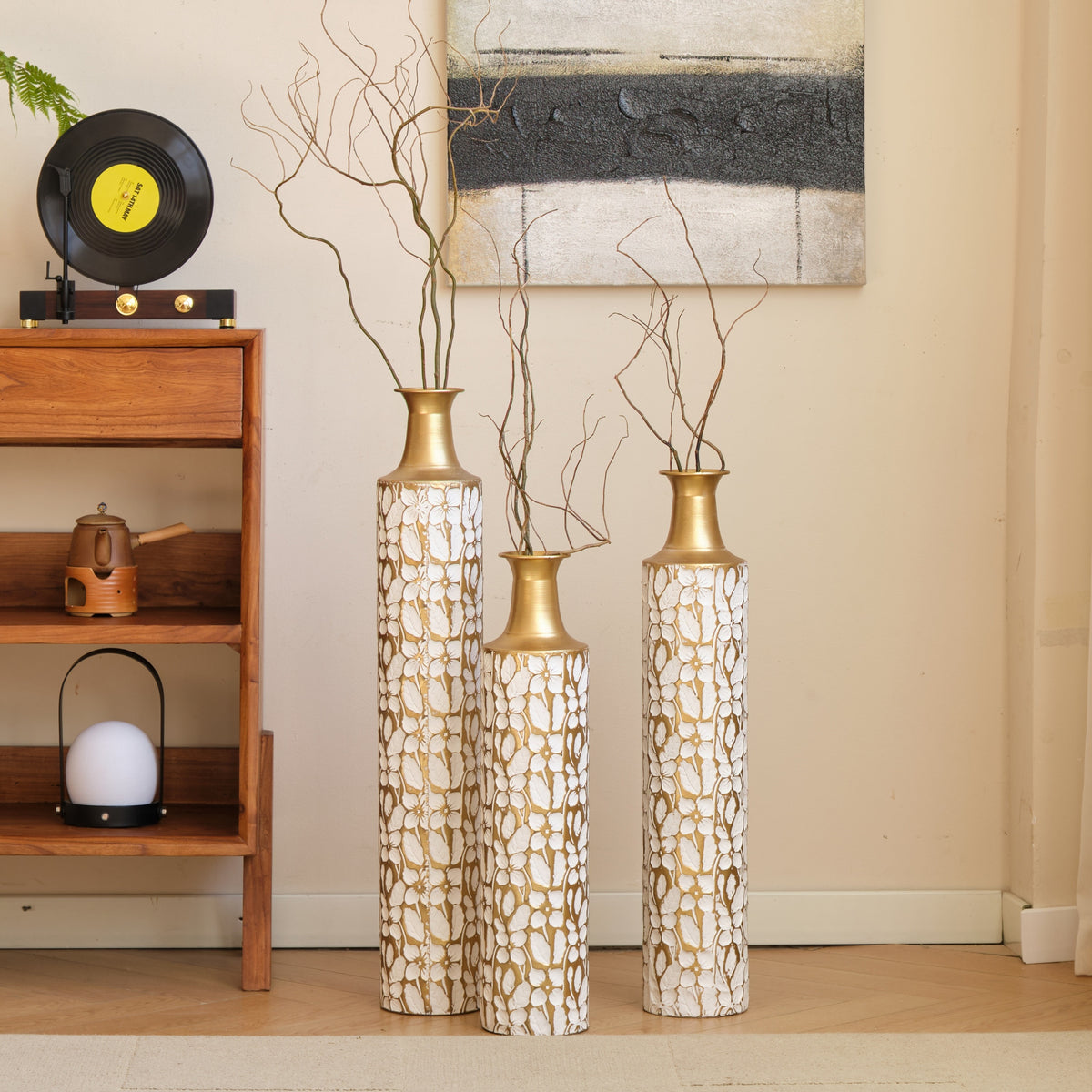 Heritage Collection Floor Vase Trio by Anthony & Home featuring elegant, tall ceramic vases with intricate patterns and a glossy finish.