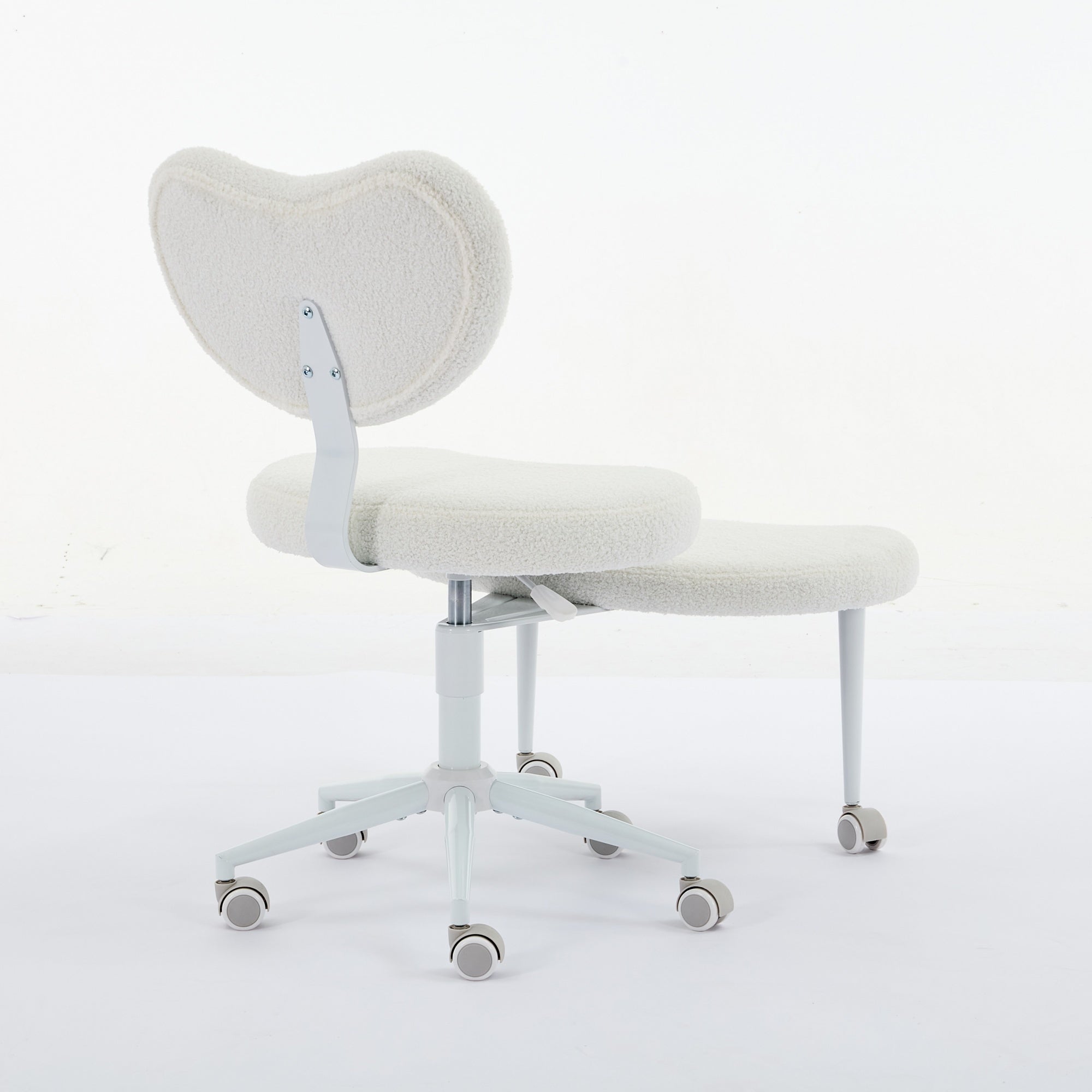 Ivory cross-legged meditation chair with wheels by Anthony & Home, featuring a comfortable padded seat for relaxed meditation.