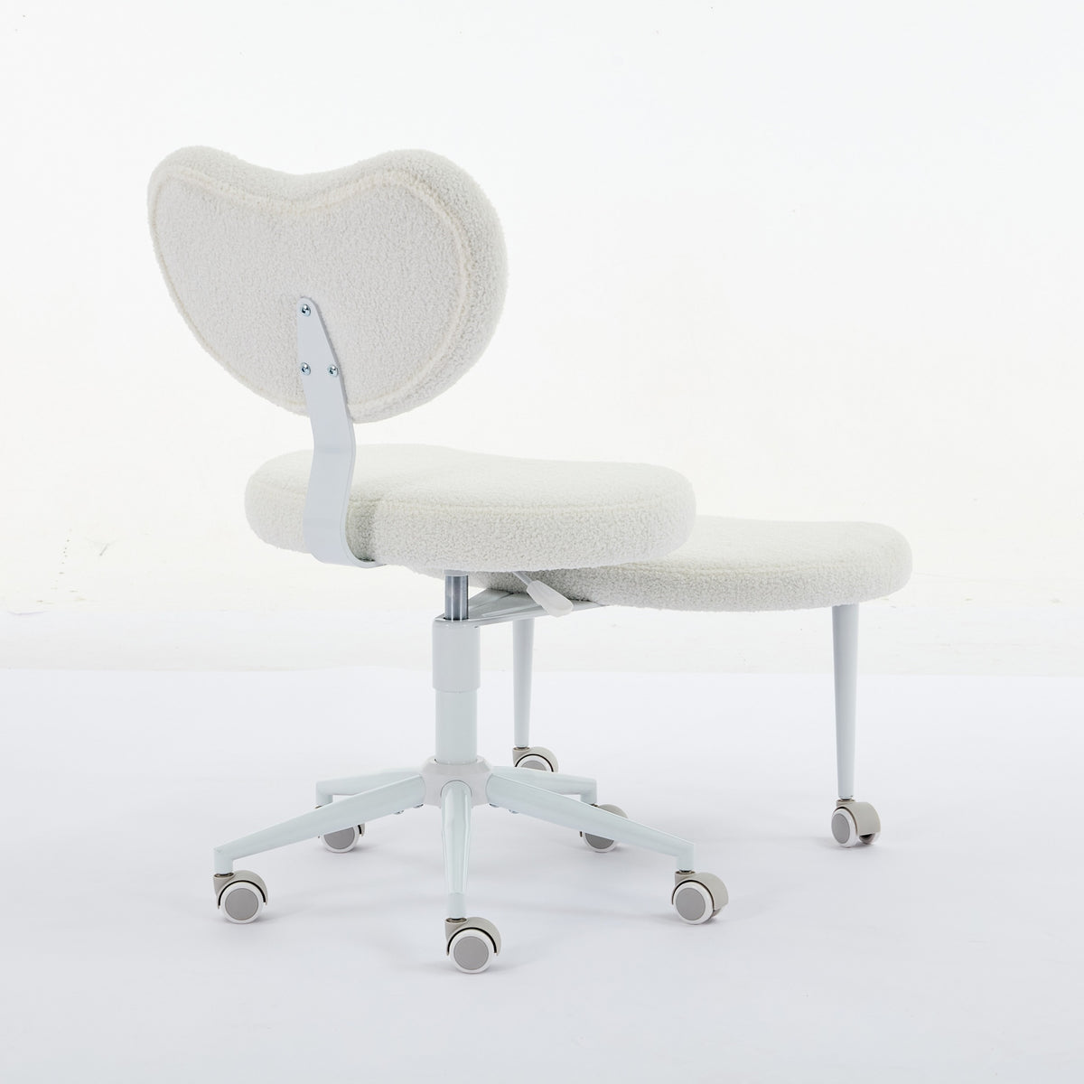 Ivory cross-legged meditation chair with wheels by Anthony & Home, featuring a comfortable padded seat for relaxed meditation.