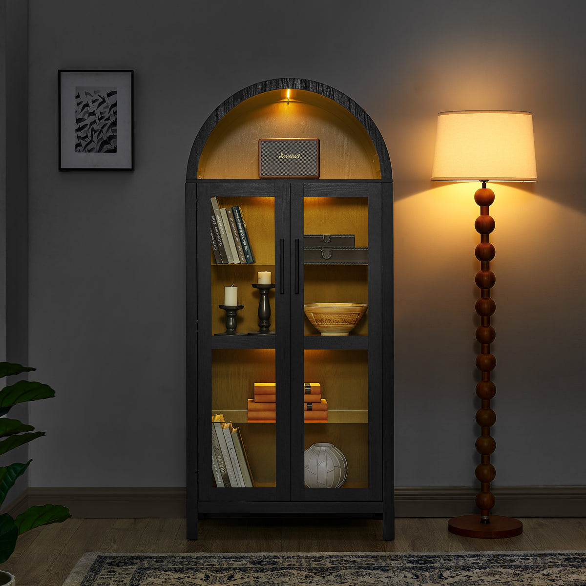Black arched lamp cabinet with glass partition, featuring an atelier-style design from Anthony & Home.