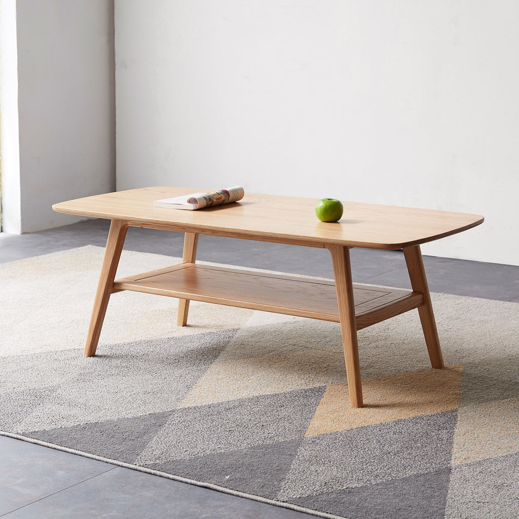 Natural oak coffee table with storage shelf from Anthony & Home's Atelier Collection, showcasing a stylish and functional living room piece.