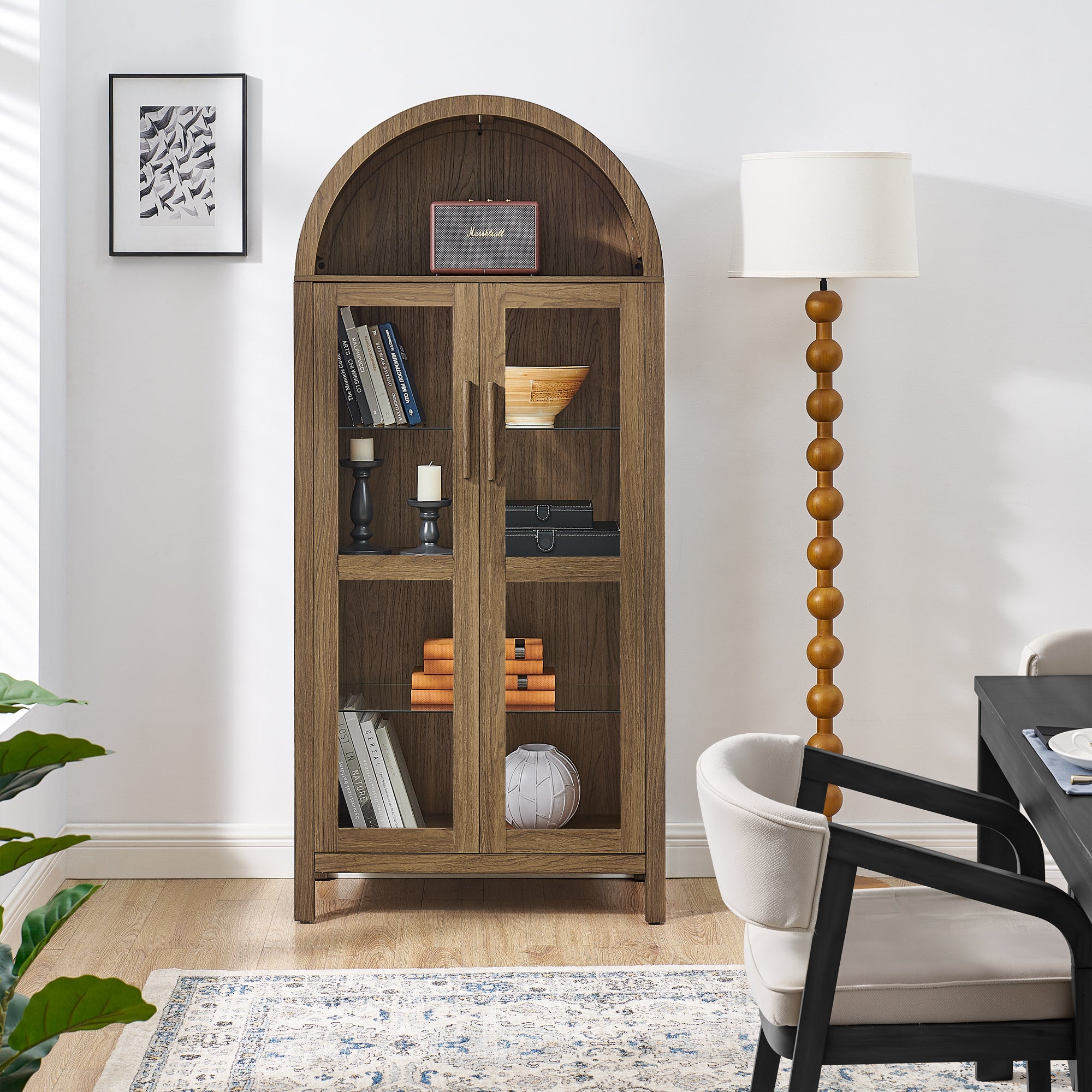 Walnut arched storage cabinet with integrated lamp from Anthony & Home, featuring elegant design and ample storage space.