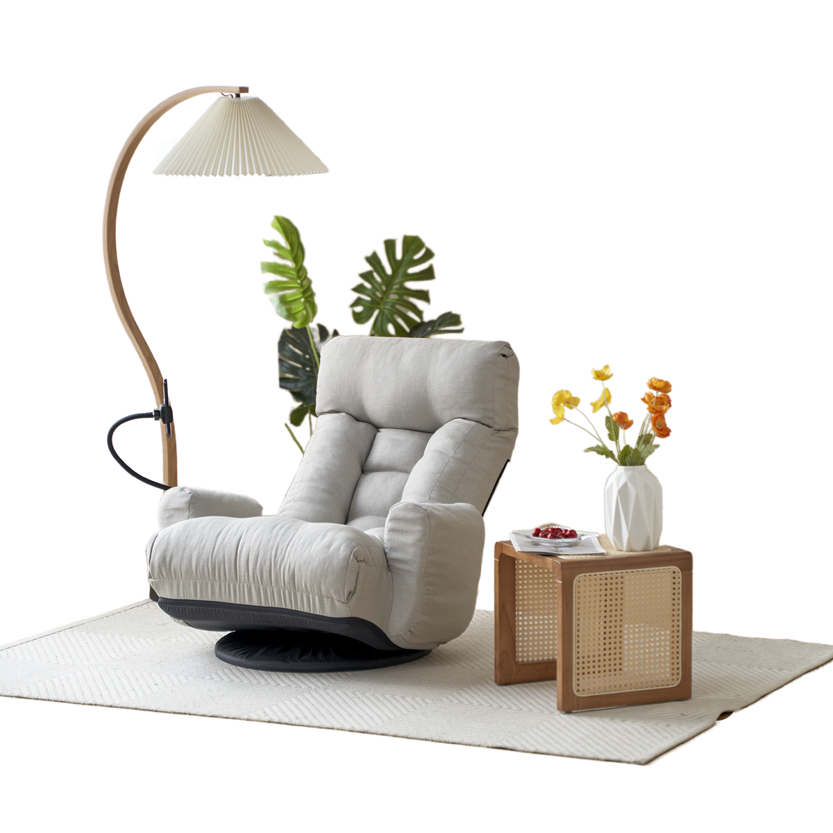 Gray Anthony & Home swivel lounge chair with 360-degree rotation, featuring a modern design and plush cushioned seat.
