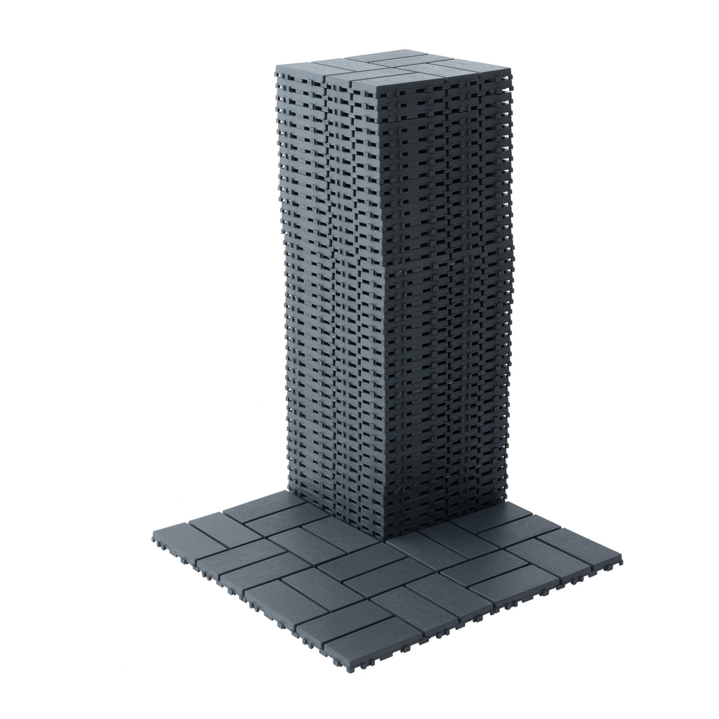 Grey polypropylene interlocking deck tiles, 12x12 inches, 44-pack by Anthony & Home, shown assembled on outdoor surface