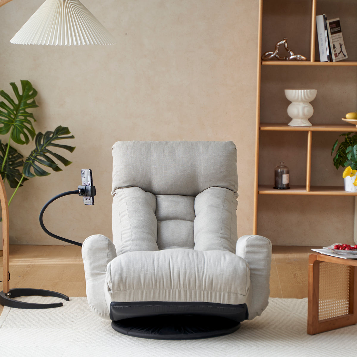 Anthony & Home gray swivel lounge chair with 360-degree rotation, featuring a modern design and comfortable cushioned seat.