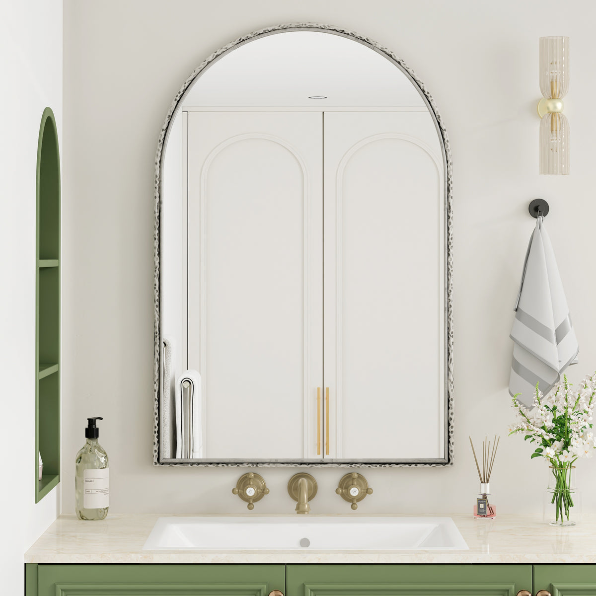 Arched silver mirror with tempered glass frame by Anthony & Home, showcasing a sleek, modern design with reflective surface.