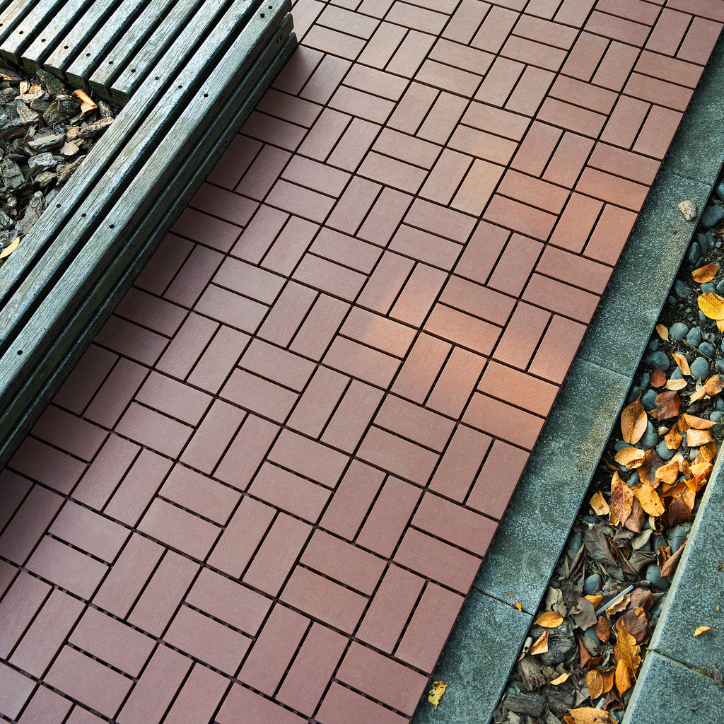 Brown polypropylene interlocking deck tiles by Anthony & Home, 12x12 inches, showing textured surface and easy interlocking design.