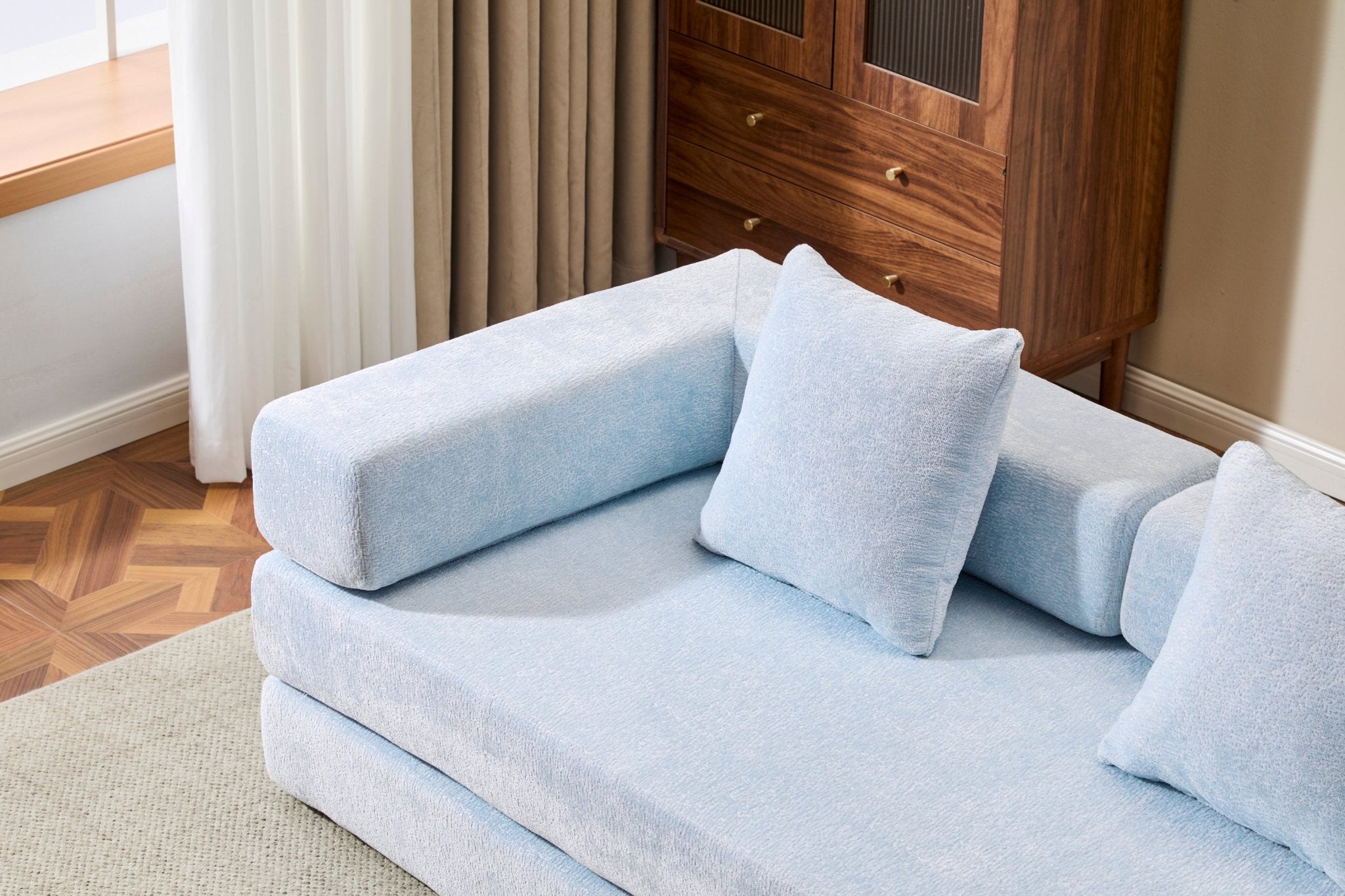 Light blue Anthony & Home Chenille convertible floor sofa bed with memory foam cushions, showcasing its soft fabric and versatile design.