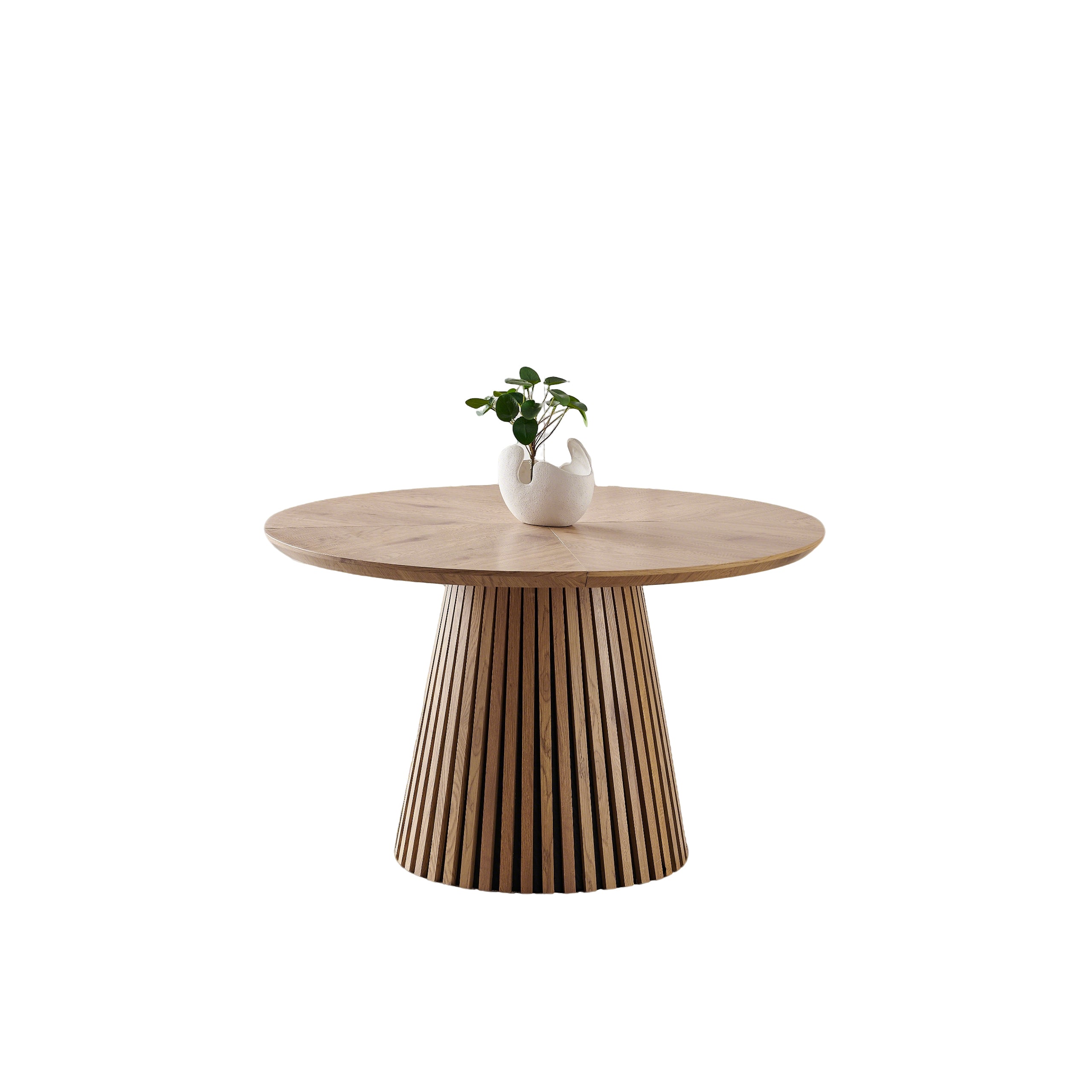 Round solid wood dining table from Anthony & Home's Atelier Collection, featuring a smooth polished surface and sturdy wooden legs.