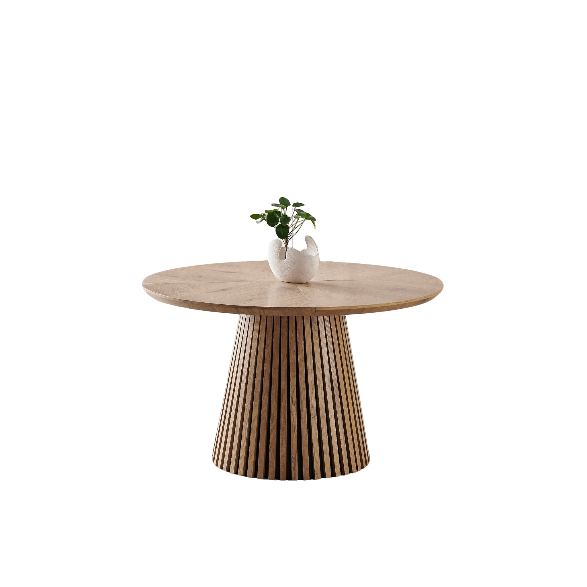 Round solid wood dining table from Anthony & Home's Atelier Collection, featuring a smooth polished surface and sturdy wooden legs.
