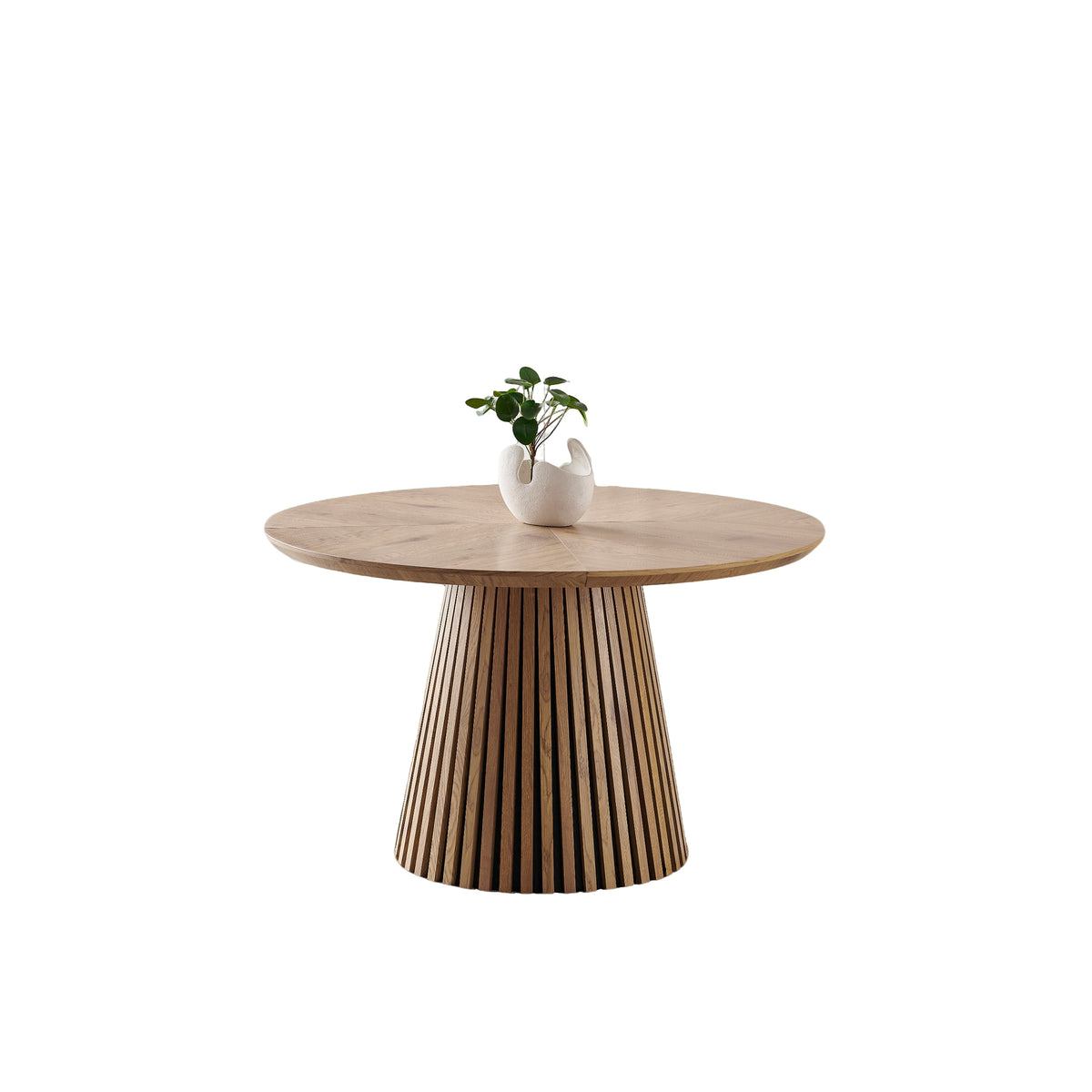 Round solid wood dining table from Anthony & Home's Atelier Collection, featuring a smooth polished surface and sturdy wooden legs.