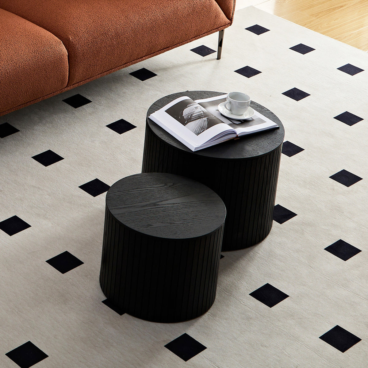 Black walnut veneer nesting coffee tables by Anthony & Home, featuring two-piece design with sleek, modern style.