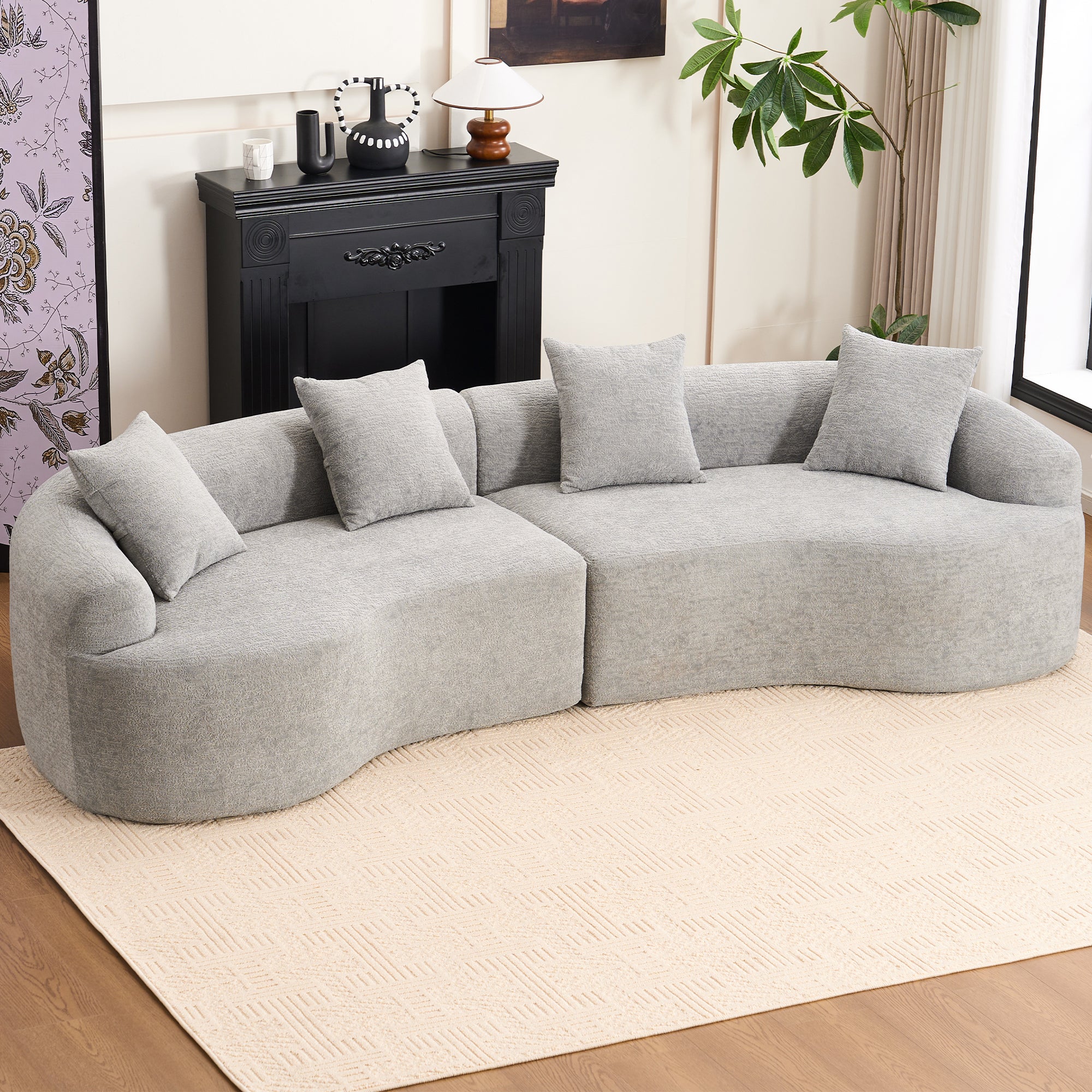 Grey curved modular sofa in chenille fabric, Anthony & Home Exclusive Edition, showcasing its plush, modern design and versatile configuration.