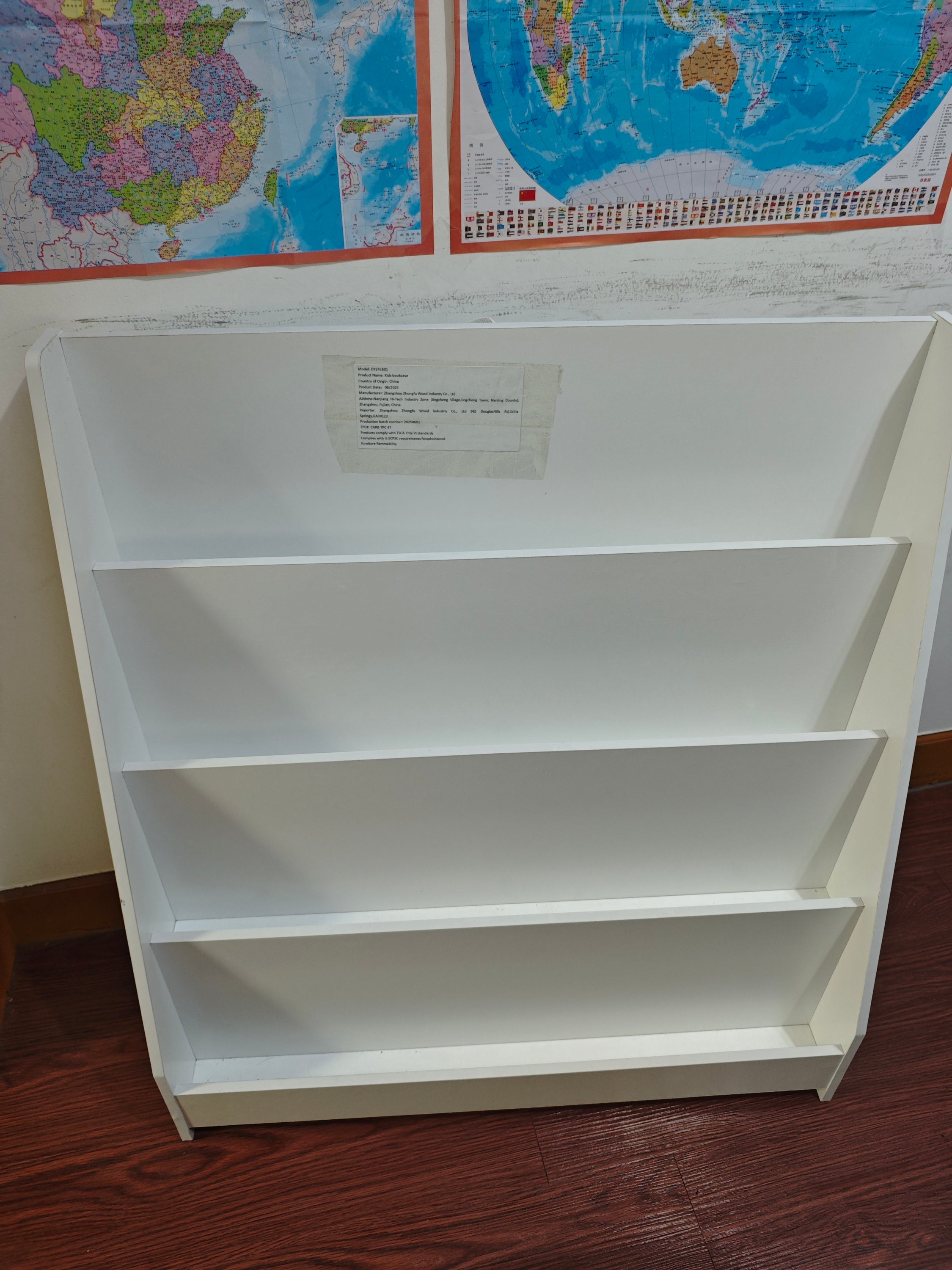 Anthony & Home Kids Bookshelf Exclusive Edition showing a colorful wooden bookshelf filled with children's books and toys.