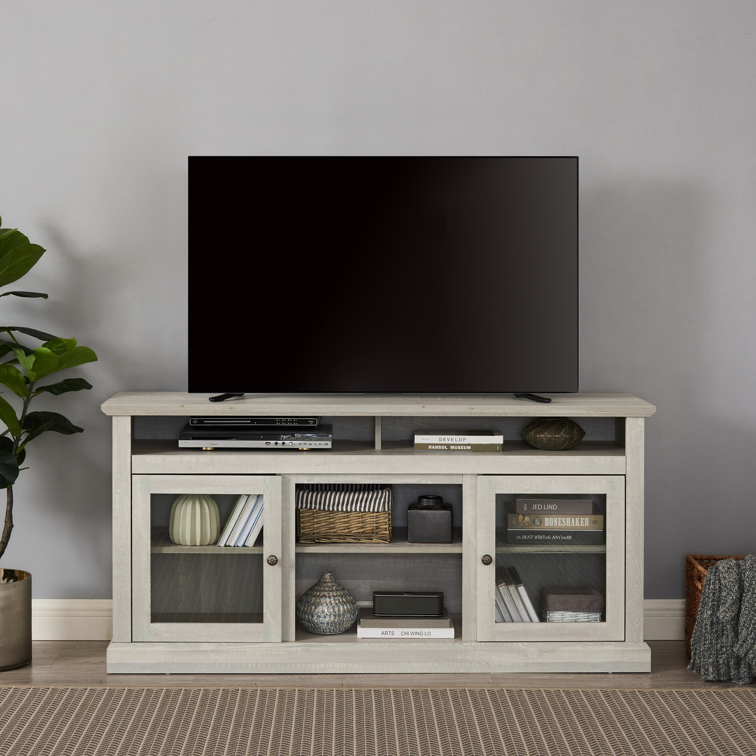 Anthony & Home Atelier Stone Gray TV console with dual storage, featuring sleek design and ample space for media devices.