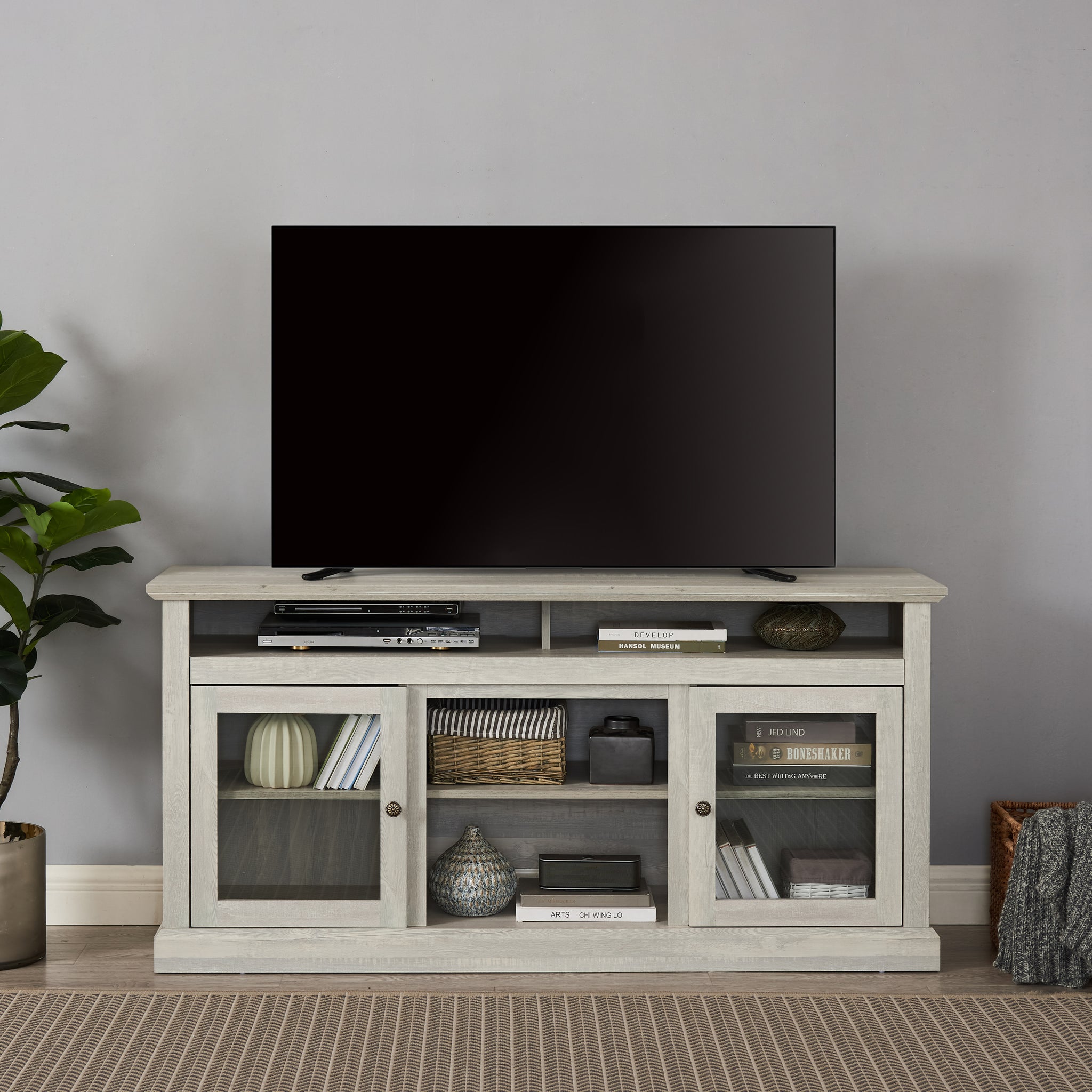 Anthony & Home Atelier Stone Gray TV console with dual storage, featuring sleek design and ample space for media devices.