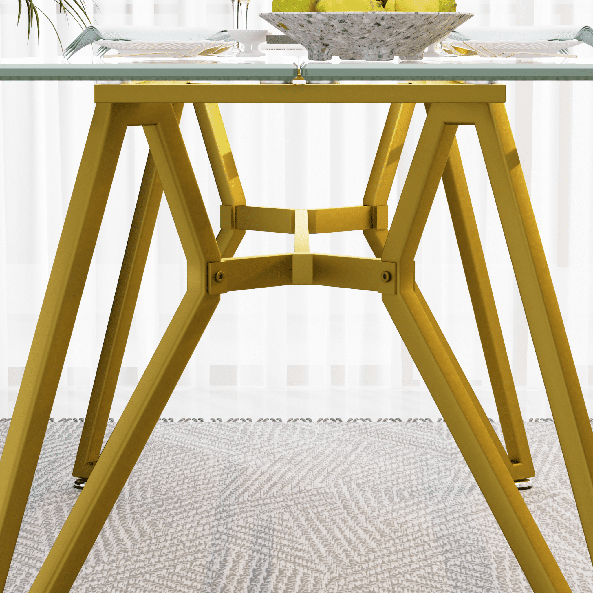 Rectangular glass dining table with gold frame from the Atelier Collection by Anthony & Home, featuring a sleek modern design.