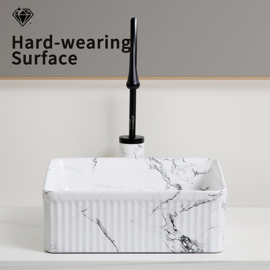 Square marble vessel sink in black and white with a 15-inch diameter, designed by Anthony & Home for modern bathrooms.