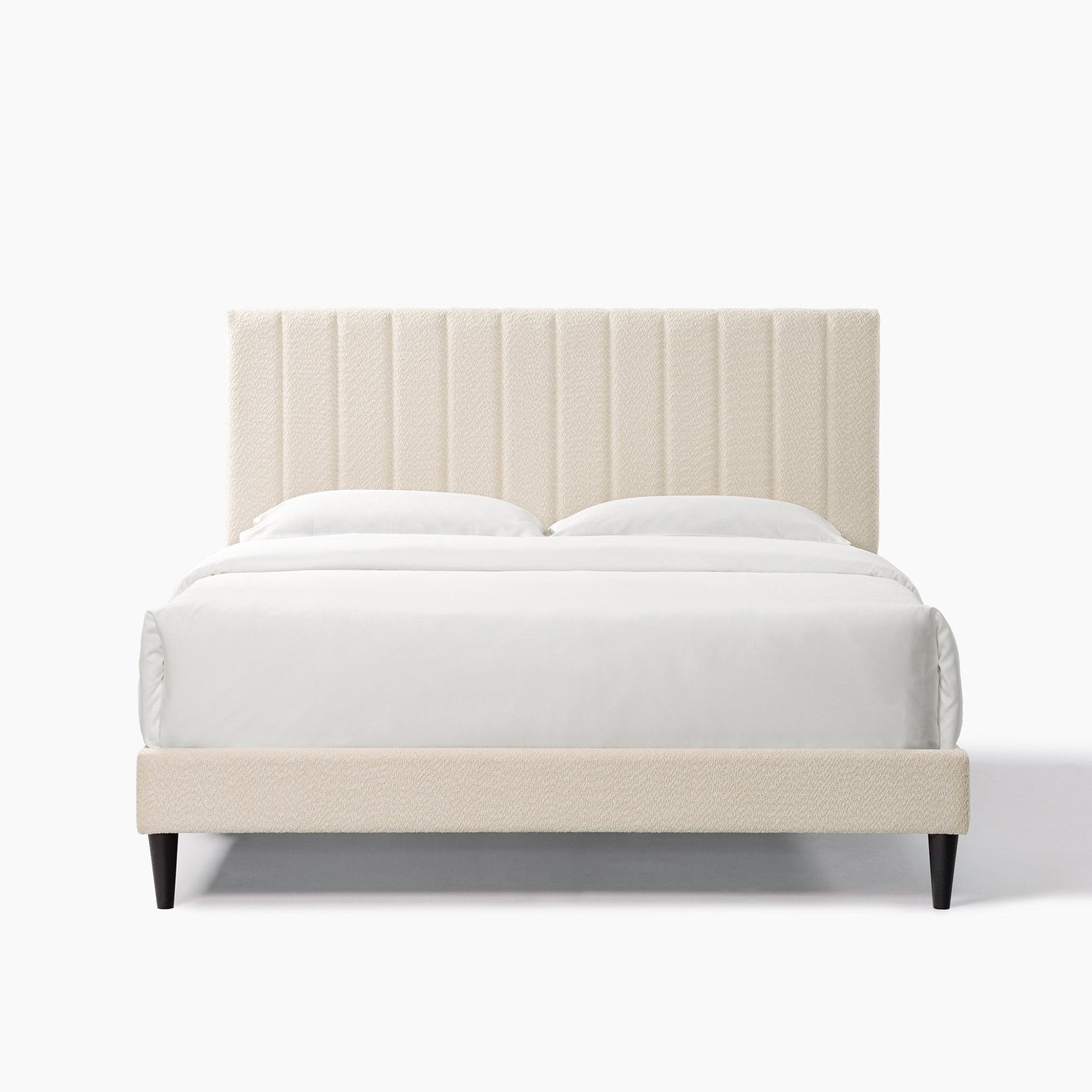 Cream boucle queen platform bed with midcentury tufted headboard, Anthony & Home, showcasing plush fabric and elegant design.