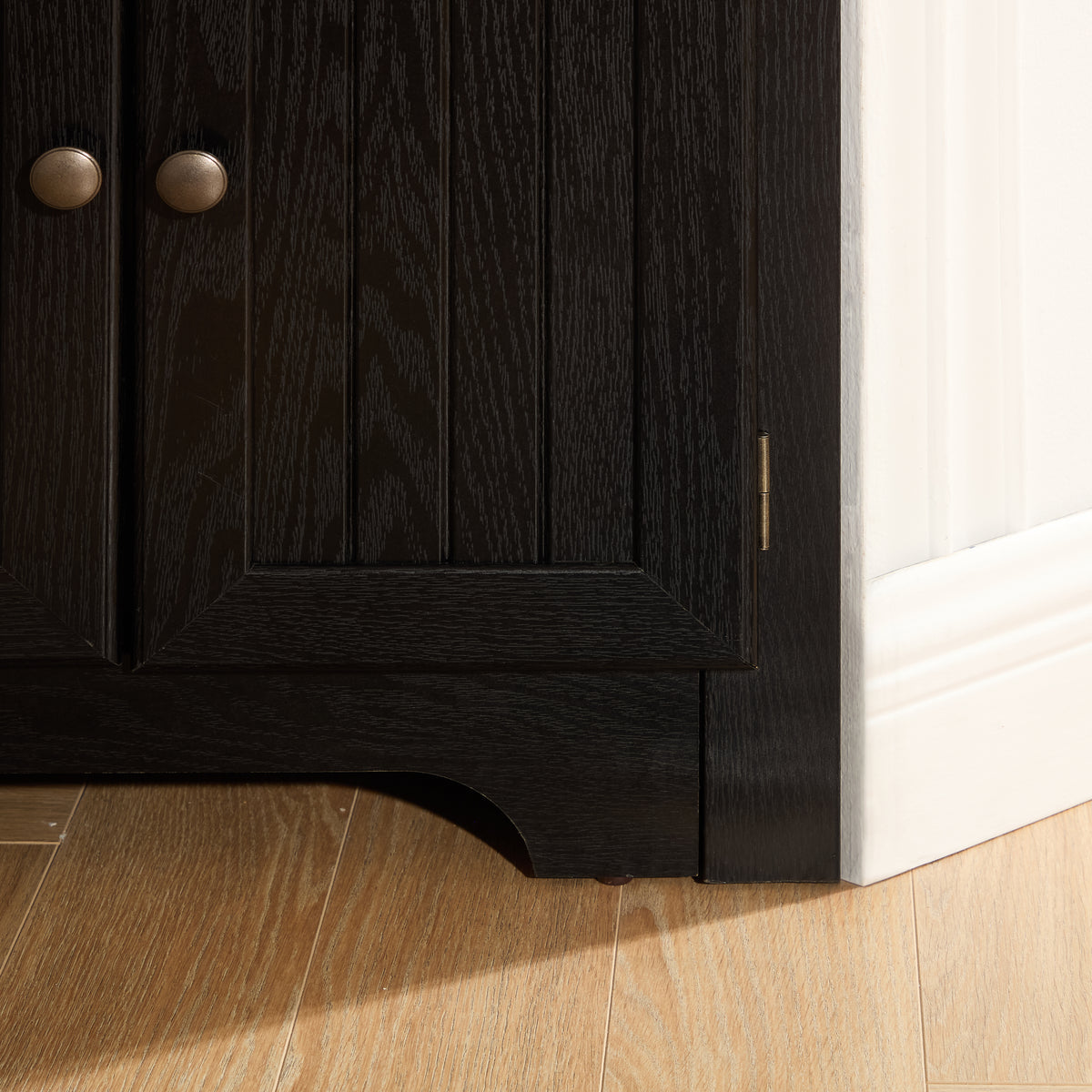 Corner pantry cabinet in matte black finish from Anthony & Home's Studio Collection, showing sleek storage with open shelving and closed compartments.