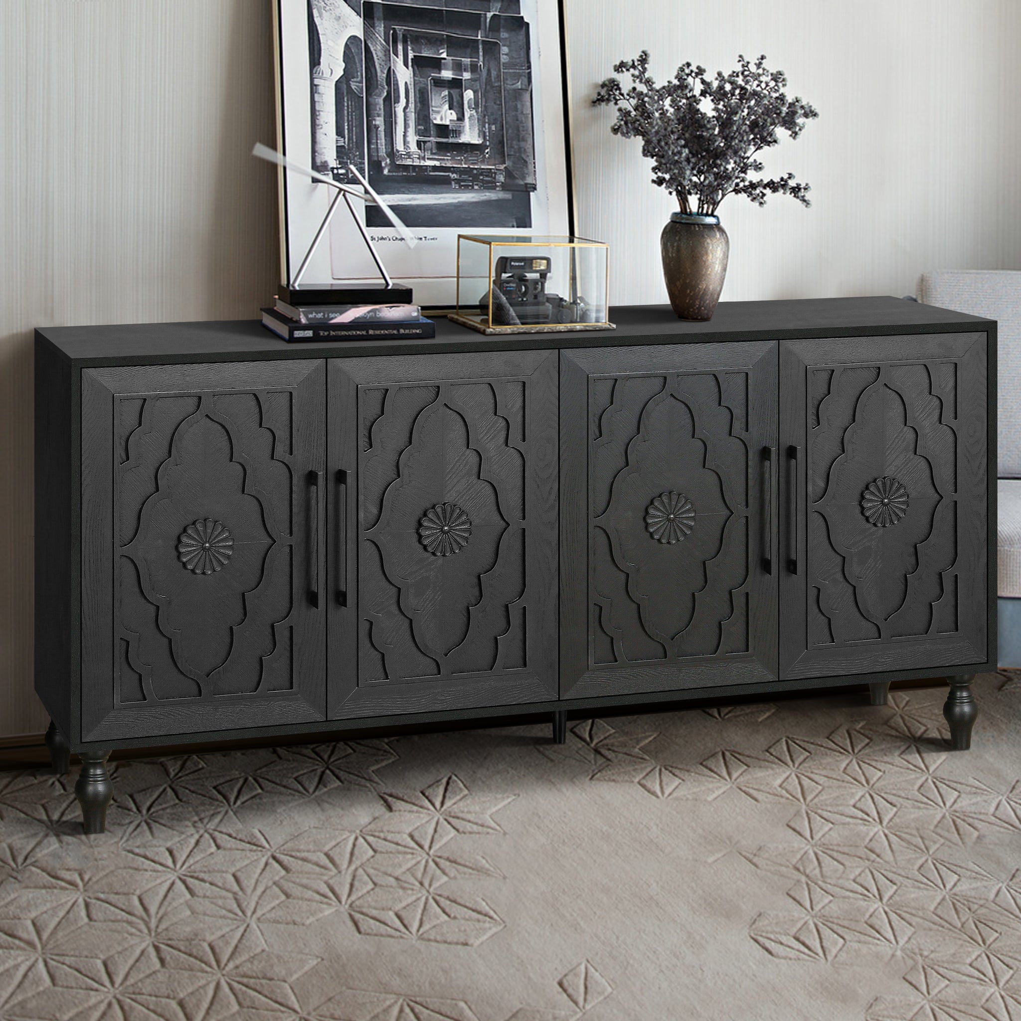 Black carved flower Anthony & Home studio storage cabinet with intricate floral detailing and multiple storage compartments.