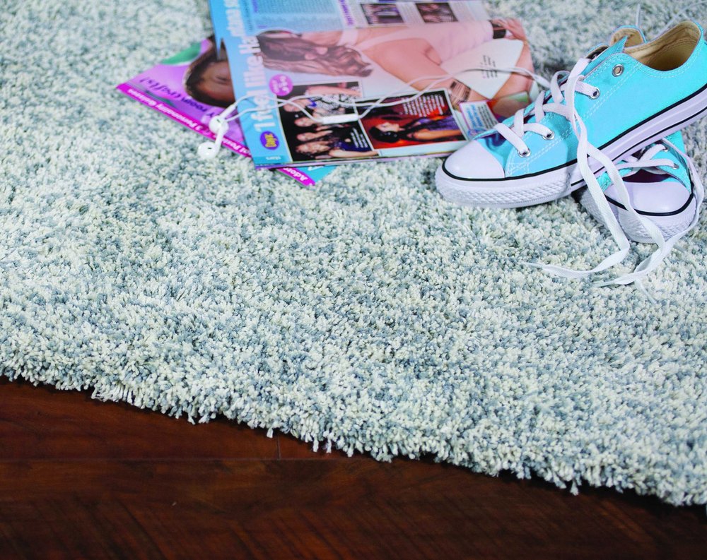 9' X 13' Slate Blue And Ivory Abstract Hand Woven Area Rug