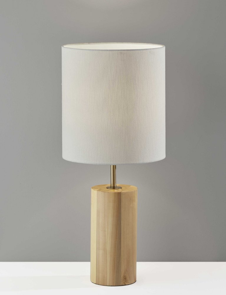 HomeRoots natural wood circular block table lamp with a smooth wooden finish and modern design on a neutral background.