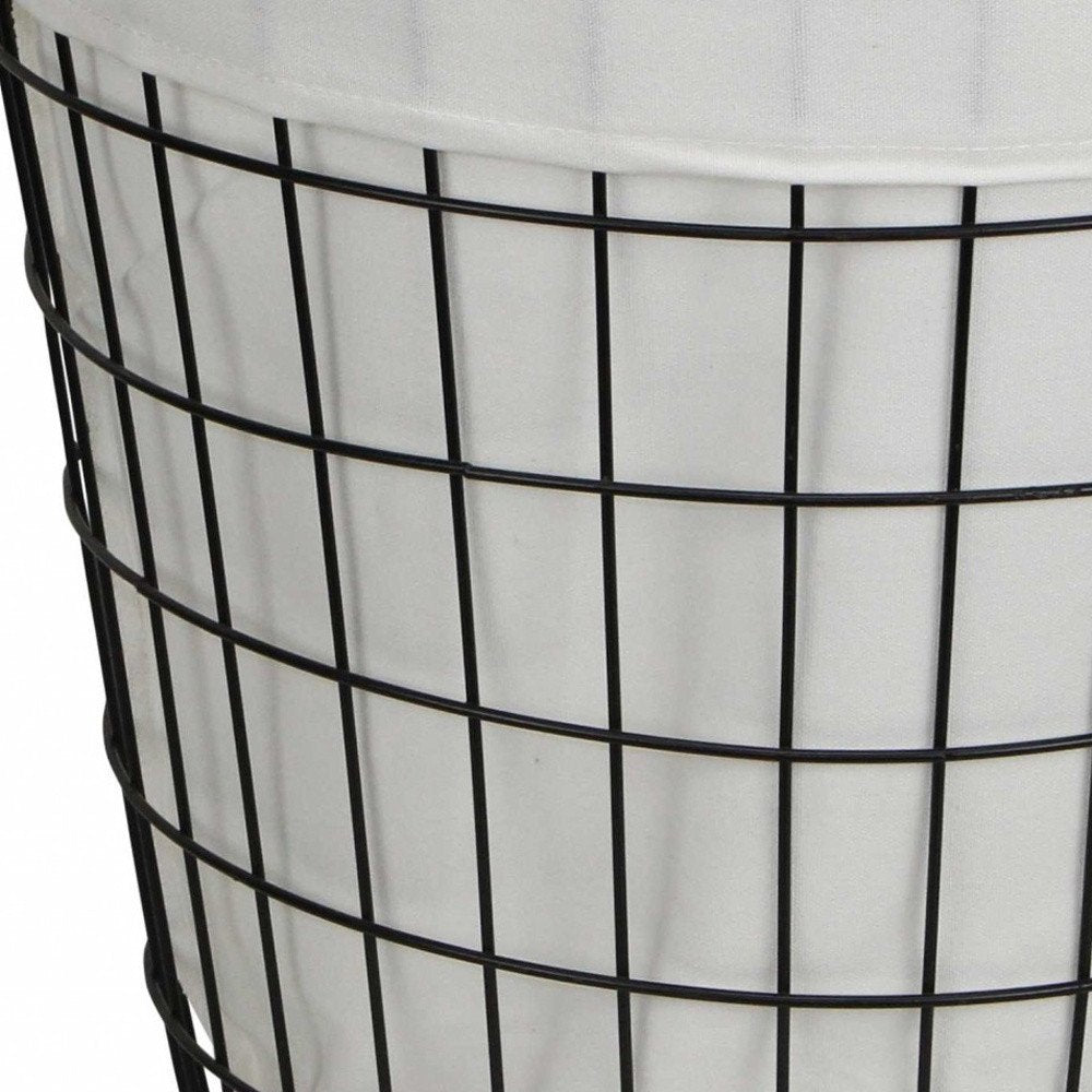 White fabric-lined metal laundry basket with handles, designed for organizing clothes and laundry storage by HomeRoots