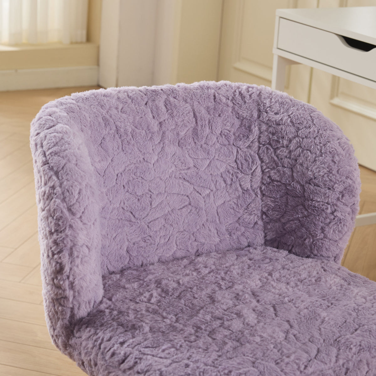 Violet Atelier rabbit-hair office chair with metal base by Anthony & Home, featuring plush upholstery and modern design.
