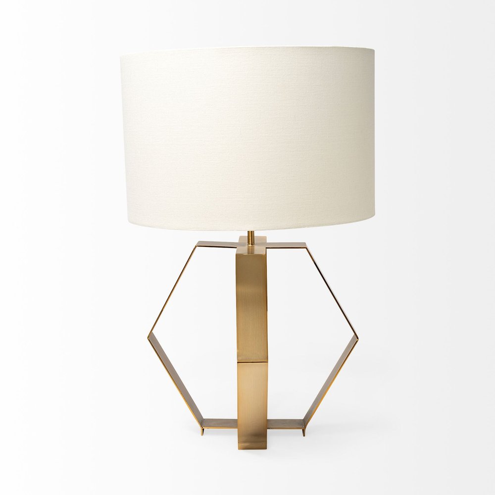 Gold geometric design table lamp by HomeRoots, modern decorative table lamp with gold finish and geometric base.