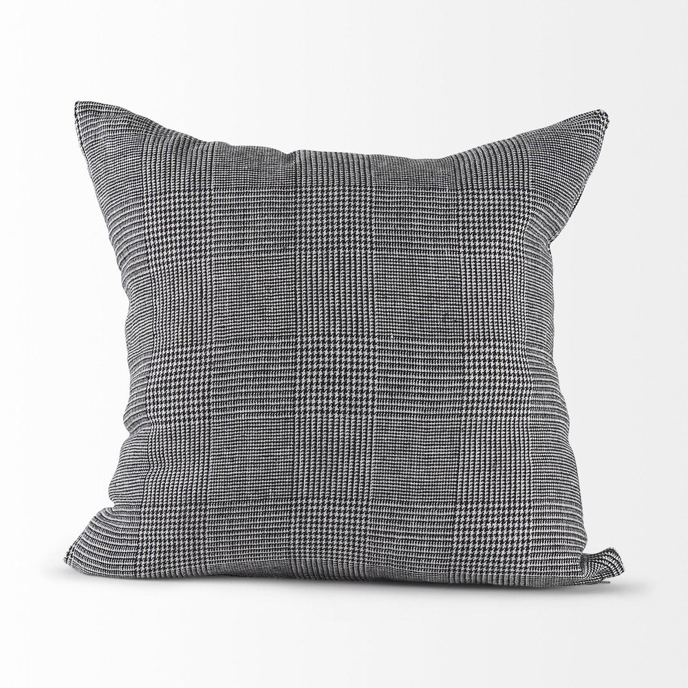 White and black patterned throw pillow cover from HomeRoots, accent pillow with geometric design, on a soft fabric background.