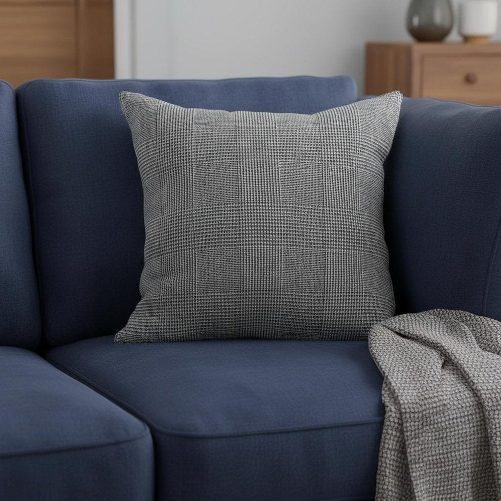 White and black patterned accent throw pillow cover from HomeRoots, featuring modern geometric design.