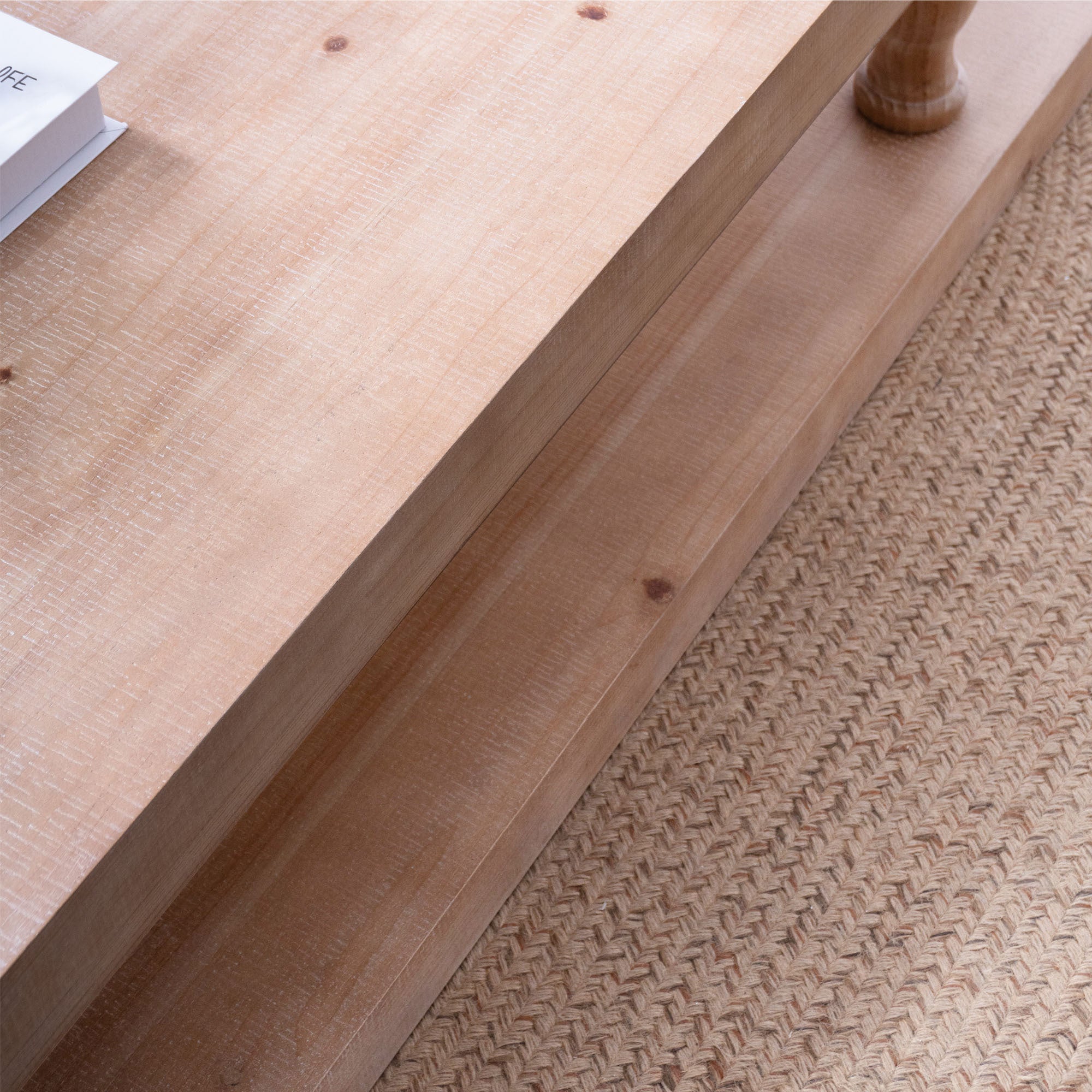 Solid wood coffee table from Anthony & Home with a light natural finish and open shelf, modern farmhouse style.