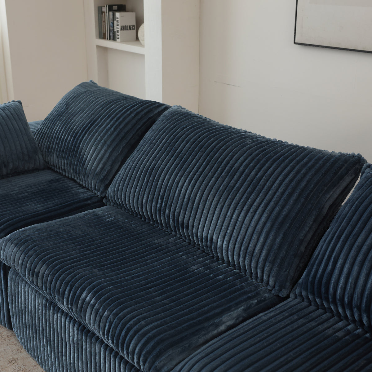 Blue Anthony & Home corduroy Cloud Sofa with deep seat and removable cushions from the Atelier Collection in a cozy living room setting.