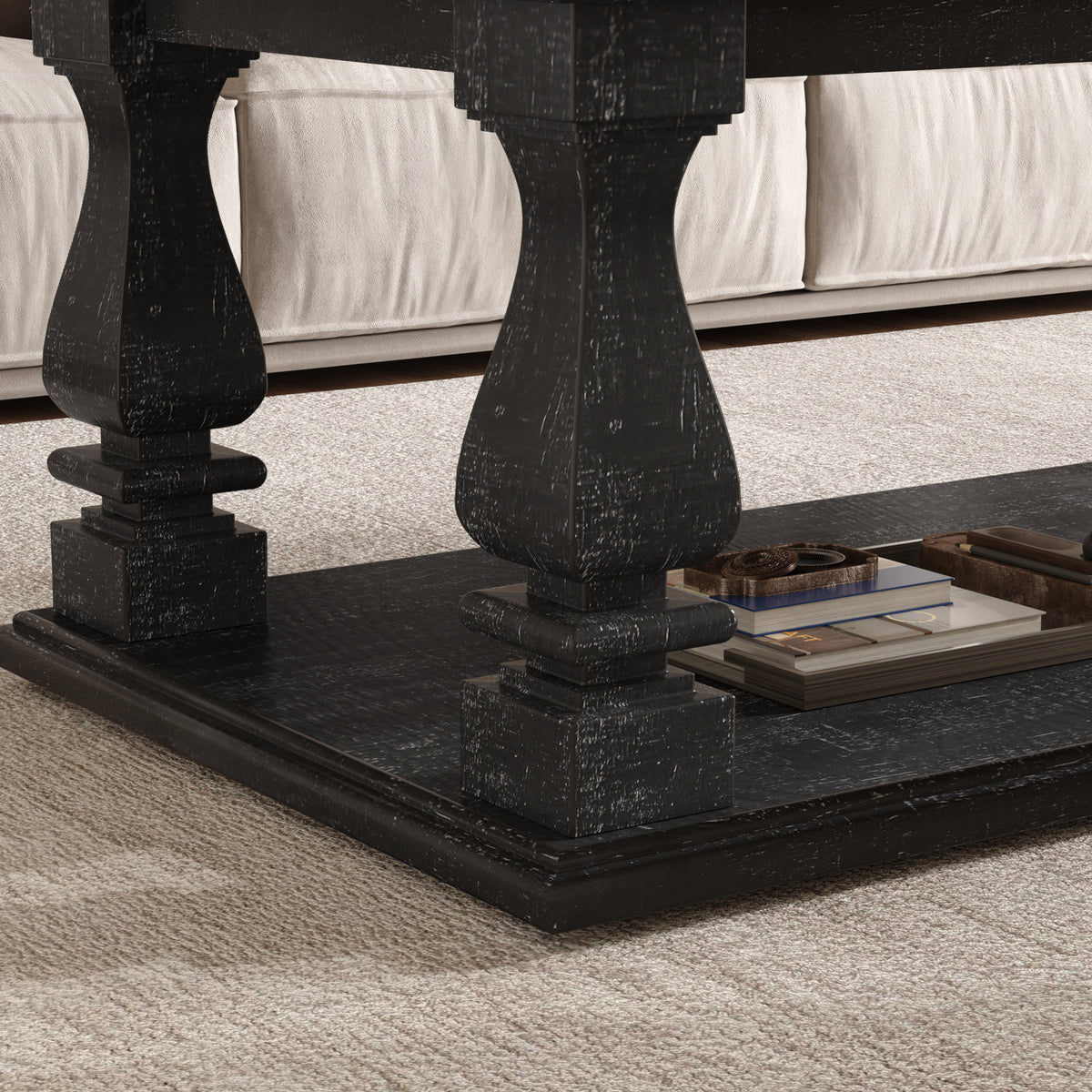 Weathered black farmhouse coffee table by Anthony & Home with heavy plank top, baluster legs, and storage shelf in a rustic style.